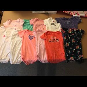 Set of 11 baby onesies